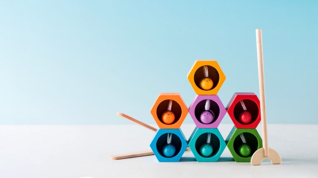 Children's wooden educational toy bees with beehives. The concept of a Montessori center